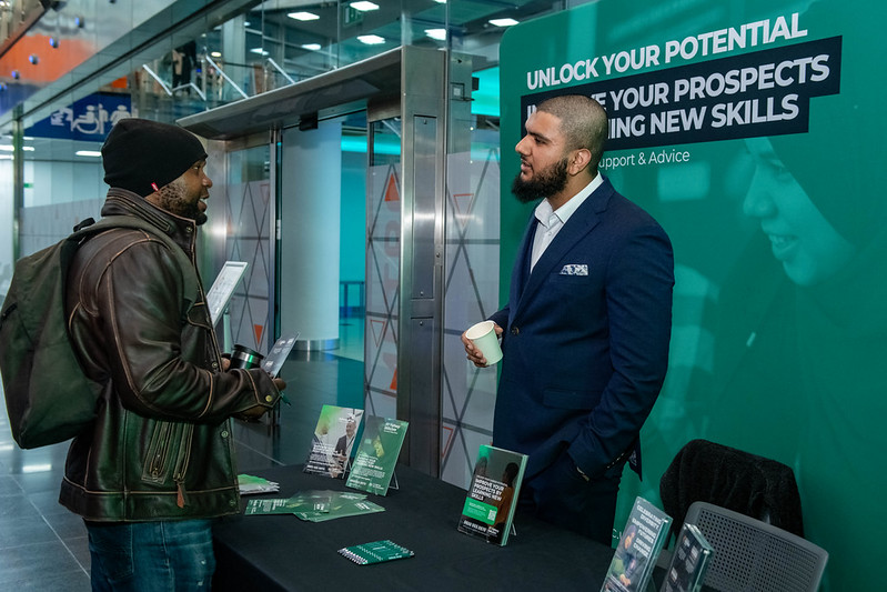 Skills and employment advice conversation at a careers stand